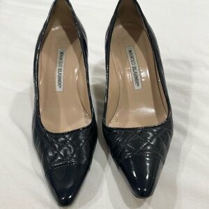 Manolo Blahnik Black classic point toe heel .